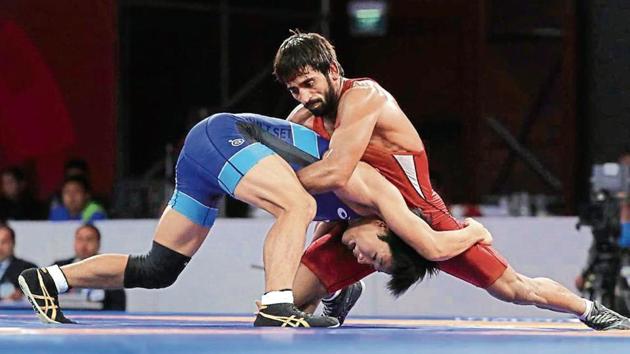 World No 1 Bajrang Punia is not only expected to qualify for the Tokyo Olympics but also favourite to win gold. (AP) World No 1 Bajrang Punia is not only expected to qualify for the Tokyo Olympics but also favourite to win gold. (AP)