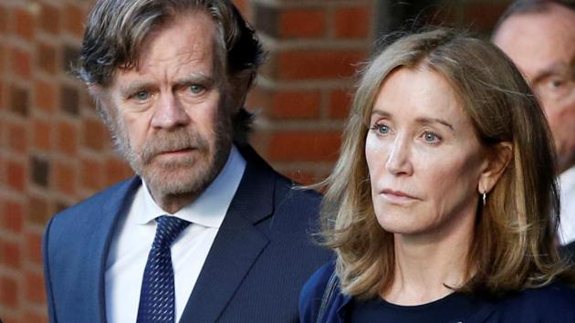 Actress Felicity Huffman leaves the federal courthouse with her husband William H. Macy, after being sentenced. (REUTERS) Actress Felicity Huffman leaves the federal courthouse with her husband William H. Macy, after being sentenced. (REUTERS)