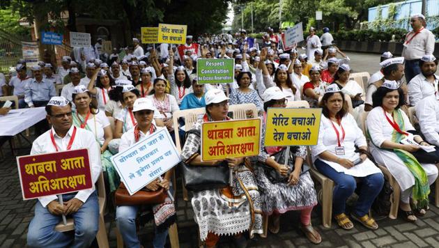 Slogans demanding a complete end to reservations and ‘Merit Bachao, Rashtra Bachao ’ reverberated in the air during a protest meet outside the Pune Divisional Commissionerate on Saturday morning. (Rahul Raut/HT PHOTO) Slogans demanding a complete end to reservations and ‘Merit Bachao, Rashtra Bachao ’ reverberated in the air during a protest meet outside the Pune Divisional Commissionerate on Saturday morning. (Rahul Raut/HT PHOTO)
