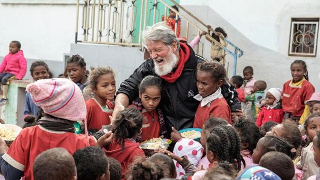 Father Pedro Opeka interacts with children from the Akamasoa Association. “These are people that no one would even acknowledge and who have regained their dignity,” said Pedro, who has lived in Madagascar for over 40 years. “We gave them a roof, an education, a job and this hell became an oasis of hope.” Aged 71, with a snowy beard and sparkly blue eyes, he is constantly tailed by a cloud of children. (Gianluigi Guercia / AFP) Father Pedro Opeka interacts with children from the Akamasoa Association. “These are people that no one would even acknowledge and who have regained their dignity,” said Pedro, who has lived in Madagascar for over 40 years. “We gave them a roof, an education, a job and this hell became an oasis of hope.” Aged 71, with a snowy beard and sparkly blue eyes, he is constantly tailed by a cloud of children. (Gianluigi Guercia / AFP)