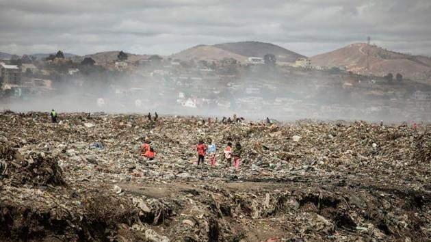 Children seen at the municipal landfill by Father Opeka’s association Akamasoa on the outskirts of Antananarivo. Opeka created a local non-governmental organization called Akamasoa (the good and faithful friends) in December 1989 to continue his work with the Malagasy people. He appointed a team of staff to help him to manage the daily activities and to provide continuous support to poor people. (Gianluigi Guercia / AFP) Children seen at the municipal landfill by Father Opeka’s association Akamasoa on the outskirts of Antananarivo. Opeka created a local non-governmental organization called Akamasoa (the good and faithful friends) in December 1989 to continue his work with the Malagasy people. He appointed a team of staff to help him to manage the daily activities and to provide continuous support to poor people. (Gianluigi Guercia / AFP)
