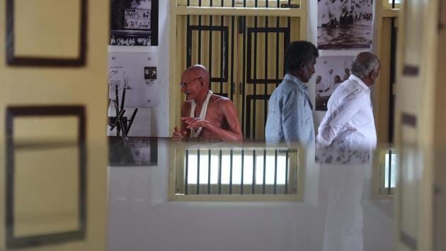 Most visitors, oddly,  don’t stop by the Saifee Villa (just outside the new memorial), where Gandhi stayed the night before he walked up to the beach to flout the salt tax. The villa has been converted into a museum , and includes a smiling statue of Gandhi on the charkha. (Raj k Raj / HT Photo ) 