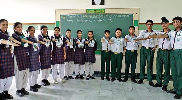 Green Land Convent School, Dugri, organised a cleanliness drive on Sunday.(HT)