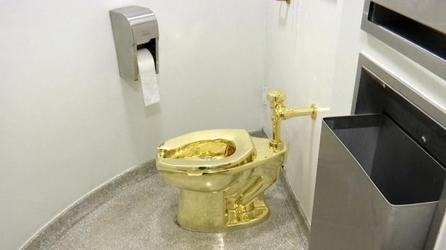 Thieves have stolen the solid gold toilet worth up to 1 million pounds from Blenheim Palace, the birthplace of Winston Churchill. The toilet, the work of Italian conceptual artist Maurizio Cattelan, had been installed only two days earlier at Blenheim Palace, west of London, after previously being on show at the Guggenheim Museum in New York.(AP)