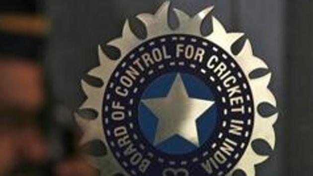 A policeman walks past a logo of the Board of Control for Cricket in India (BCCI).(REUTERS) A policeman walks past a logo of the Board of Control for Cricket in India (BCCI).(REUTERS)