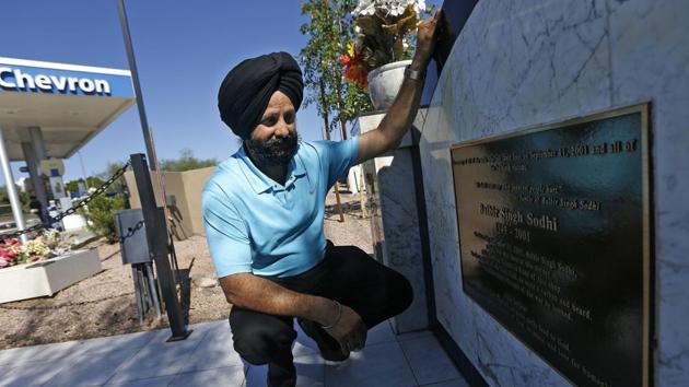 In this Aug. 19, 2016, file photo, Indian Sikh immigrant Rana Singh Sodhi kneels next to a memorial in Mesa, Ariz, for his murdered brother, Balbir Singh Sodhi, who was gunned down at the site four days after the Sept. 11, 2001 attacks by a man who mistook him for a Muslim because of his turban and beard. (Photo: AP) In this Aug. 19, 2016, file photo, Indian Sikh immigrant Rana Singh Sodhi kneels next to a memorial in Mesa, Ariz, for his murdered brother, Balbir Singh Sodhi, who was gunned down at the site four days after the Sept. 11, 2001 attacks by a man who mistook him for a Muslim because of his turban and beard. (Photo: AP)