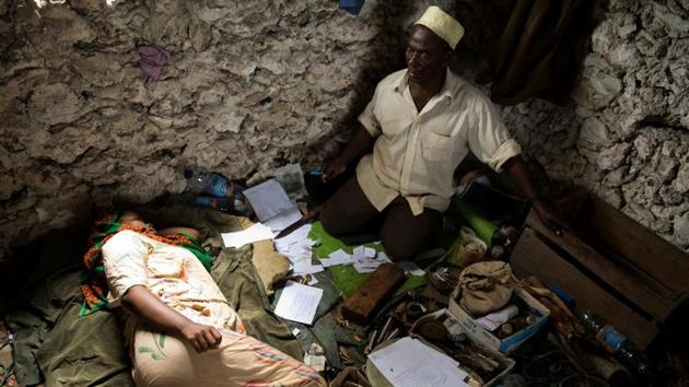 Traditional healer Haji Mrisho speaks with pregnant patient Hidaya Rayabu, 22, at his office in Zanzibar City. Some healers, like Mrisho, mainly give blessings to pregnant women to prevent their unborn babies being possessed by djinns. Others, like sheikhs at the Shifaa Herbal clinic, read the Quran to cast out the djinns blamed for many maladies. (Nicky Woo / REUTERS) Traditional healer Haji Mrisho speaks with pregnant patient Hidaya Rayabu, 22, at his office in Zanzibar City. Some healers, like Mrisho, mainly give blessings to pregnant women to prevent their unborn babies being possessed by djinns. Others, like sheikhs at the Shifaa Herbal clinic, read the Quran to cast out the djinns blamed for many maladies. (Nicky Woo / REUTERS)