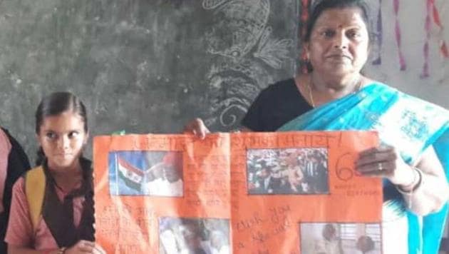 A student and a teacher of government school in UP’s Narur hold a birthday card for PM Modi, September 16, 2019. (HT Photo) A student and a teacher of government school in UP’s Narur hold a birthday card for PM Modi, September 16, 2019. (HT Photo)