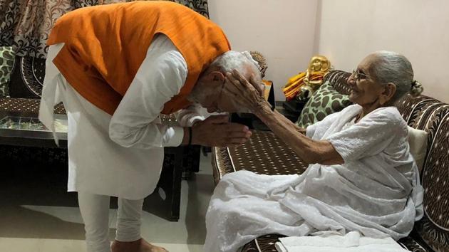 PM Modi seeks blessing of his mother (BJP/Twitter) PM Modi seeks blessing of his mother (BJP/Twitter)