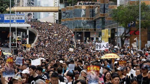One week later, on July 7, thousands marched in Kowloon - an area popular with mainland Chinese tourists - in a bid to explain their concerns. The protests had until this point received little airtime in mainland China’s state-run media. Two days later Lam reiterated that the bill was “dead” urging an end to demonstrations. It wasn’t however still completely withdrawn. (Thomas Peter / REUTERS) One week later, on July 7, thousands marched in Kowloon - an area popular with mainland Chinese tourists - in a bid to explain their concerns. The protests had until this point received little airtime in mainland China’s state-run media. Two days later Lam reiterated that the bill was “dead” urging an end to demonstrations. It wasn’t however still completely withdrawn. (Thomas Peter / REUTERS)