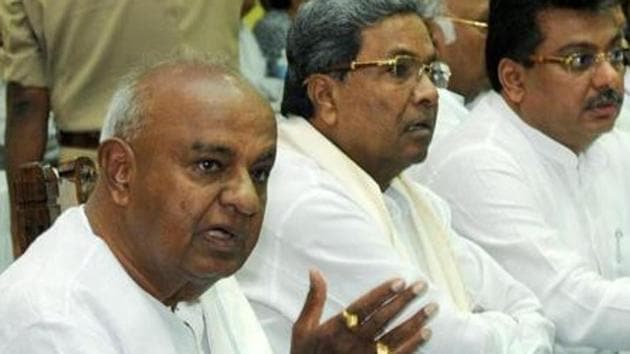 Former Prime Minister HD Deve Gowda with Congress leader Siddaramaiah (PTI File) Former Prime Minister HD Deve Gowda with Congress leader Siddaramaiah (PTI File)
