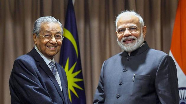 Prime Minister Narendra Modi with Malaysian counterpart Dr. Mahathir Mohamad.(PTI Photo)