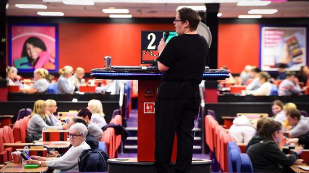 The number was at least twice that however in the 1980s, albeit smaller venues. “We’re quite happy to say they invented it but we own it,” said Paul McGlinchey, who manages the 1,500-seat club -- the country’s biggest by capacity. “There’s no doubt about it: Glasgow loves its bingo,” he added, as around 500 players, predominantly older women, filled row after row of brightly coloured seats and tables. (Andy Buchanan / AFP) The number was at least twice that however in the 1980s, albeit smaller venues. “We’re quite happy to say they invented it but we own it,” said Paul McGlinchey, who manages the 1,500-seat club -- the country’s biggest by capacity. “There’s no doubt about it: Glasgow loves its bingo,” he added, as around 500 players, predominantly older women, filled row after row of brightly coloured seats and tables. (Andy Buchanan / AFP)