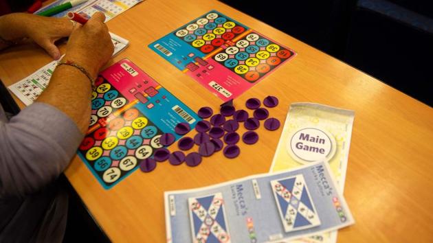 McGlinchey said the enduring communities around the bingo clubs, despite an increasingly mobile population elsewhere in Britain, had kept bingo “in the DNA” of the city. Locals put its popularity down to the fun-loving and sociable nature of Glaswegians. (Andy Buchanan / AFP) McGlinchey said the enduring communities around the bingo clubs, despite an increasingly mobile population elsewhere in Britain, had kept bingo “in the DNA” of the city. Locals put its popularity down to the fun-loving and sociable nature of Glaswegians. (Andy Buchanan / AFP)