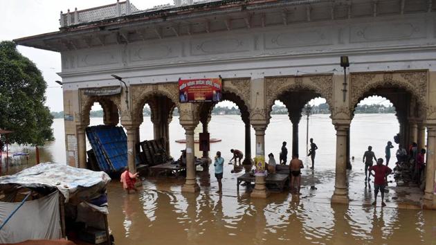 Flood affected families at a temporary relief camp that is also inundated in Prayagraj on Tuesday. At least 14 people were killed in rain-related incidents, including lightning and drowning, in the state on Tuesday. Adityanath has announced compensation of Rs 4 lakh each to kin of the victims. (ANI) Flood affected families at a temporary relief camp that is also inundated in Prayagraj on Tuesday. At least 14 people were killed in rain-related incidents, including lightning and drowning, in the state on Tuesday. Adityanath has announced compensation of Rs 4 lakh each to kin of the victims. (ANI)