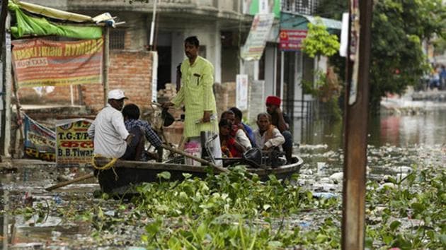 Residents said they are forced to wade through knee-deep water in the flood-affected region. “The water is rising every hour here. In 2013 and 2016 there were floods here. After that the government had given us an assurance that the situation will not be repeated but nothing has changed here,” a local, Mohammad Ahmed Khan said. (Rajesh Kumar Singh / AP) Residents said they are forced to wade through knee-deep water in the flood-affected region. “The water is rising every hour here. In 2013 and 2016 there were floods here. After that the government had given us an assurance that the situation will not be repeated but nothing has changed here,” a local, Mohammad Ahmed Khan said. (Rajesh Kumar Singh / AP)