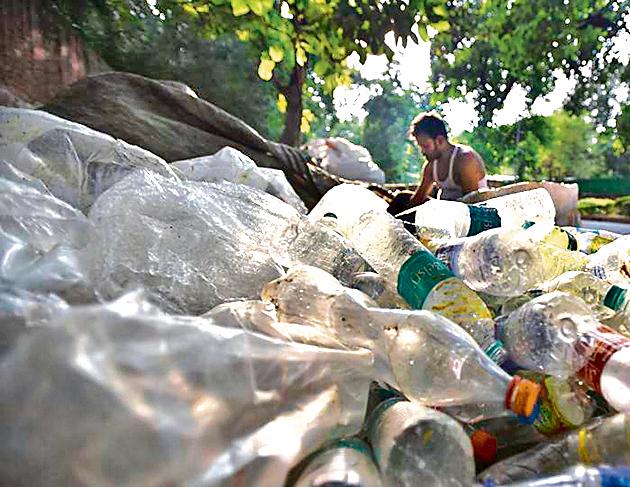 A scrap vendor sorts plastic at Mandi House in New Delhi. The Delhi govt is planning to ban some single-use plastic items in the national capital, after Prime Minister Narendra Modi pitched for India doing away with single-use plastic. While there’s no official definition of ‘single-use plastic’, it largely refers to plastic bags, cups, water bottles, wrappers, sachets and straws that are said to contribute significantly to river and soil pollution. (Raj K Raj / HT Photo) A scrap vendor sorts plastic at Mandi House in New Delhi. The Delhi govt is planning to ban some single-use plastic items in the national capital, after Prime Minister Narendra Modi pitched for India doing away with single-use plastic. While there’s no official definition of ‘single-use plastic’, it largely refers to plastic bags, cups, water bottles, wrappers, sachets and straws that are said to contribute significantly to river and soil pollution. (Raj K Raj / HT Photo)