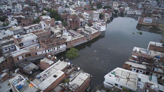 A view of a residential colony at Salori, flooded by the River Ganga, on Tuesday. A senior official said authorities in Allahabad and Varanasi have been asked to make all necessary arrangements to deal with the situation and flood ‘chowkis’, to monitor the water levels in the rivers, have been activated. (PTI) A view of a residential colony at Salori, flooded by the River Ganga, on Tuesday. A senior official said authorities in Allahabad and Varanasi have been asked to make all necessary arrangements to deal with the situation and flood ‘chowkis’, to monitor the water levels in the rivers, have been activated. (PTI)