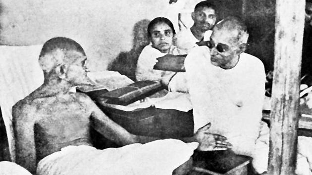 Mahatma Gandhi seen speaking to C Rajagopalachari.(NATIONAL GANDHI MUSEUM)