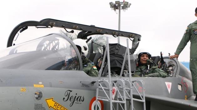 Rajnath Singh being prepared to fly on ‘Tejas’, an Indigenous Light Combat Aircraft from Bengaluru’s HAL Airport. (TWITTER: @rajnathsingh) Rajnath Singh being prepared to fly on ‘Tejas’, an Indigenous Light Combat Aircraft from Bengaluru’s HAL Airport. (TWITTER: @rajnathsingh)