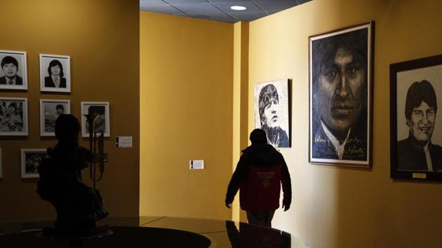 In this Sept. 13, 2019 photo, photos of Bolivia's President Eva Morales adorn the walls at the Democratic and Cultural Revolution Museum in Orinoca, Bolivia. The museum in a remote town high up in the deserts of the Bolivian altiplano was built by President Morales in his birthplace of Orinoca to honor the country’s indigenous peoples. (AP Photo/Juan Karita)(AP)