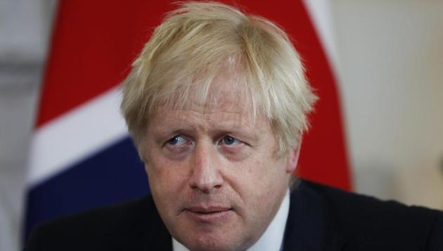 British Prime Minister Boris Johnson said he was not embarrassed after being filmed lying to the father of a sick child.(AP) British Prime Minister Boris Johnson said he was not embarrassed after being filmed lying to the father of a sick child.(AP)