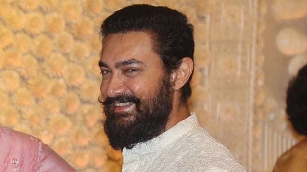 Aamir Khan at the Ganesh Chaturthi celebrations at Mukesh Ambani's residence Antilla in Mumbai.(PTI)