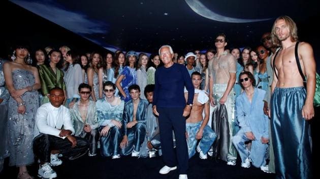 Italian fashion designer Giorgio Armani poses with models after a presentation from the Emporio Armani Spring/Summer 2020 collection during fashion week in Milan, Italy, September 19, 2019. REUTERS/Alessandro Garofalo(REUTERS)