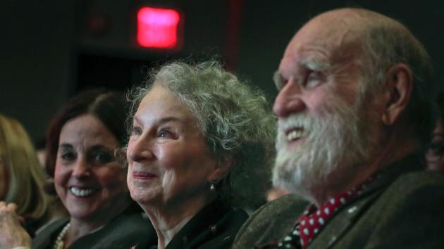 In this March 16, 2017 file photo, author Margaret Atwood, center, appears with her editor Nan Talese, left, and partner Graeme Gibson in New York.(AP)