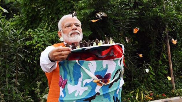 Prime Minister Narendra Modi releasing butterflies at 'Butterfly Garden' during his visit to Kevadia in Narmada on Tuesday.(ANI Photo) Prime Minister Narendra Modi releasing butterflies at 'Butterfly Garden' during his visit to Kevadia in Narmada on Tuesday.(ANI Photo)