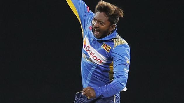 Sri Lanka's Akila Dananjaya celebrates the dismissal of New Zealand's Martin Guptill.(AP)