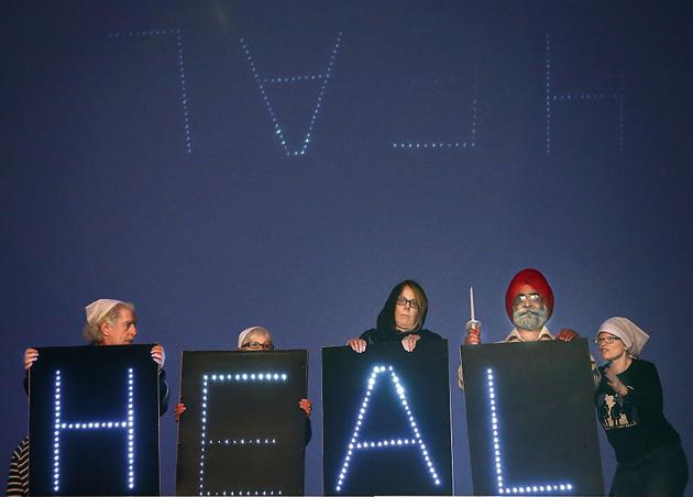 A vigil on August 5, 2013 to mark the first anniversary of the shooting at the Sikh temple in Oak Creek, Wisconsin. White supremacist Michael Page killed six members of the temple during a shooting rampage. (Getty Images) A vigil on August 5, 2013 to mark the first anniversary of the shooting at the Sikh temple in Oak Creek, Wisconsin. White supremacist Michael Page killed six members of the temple during a shooting rampage. (Getty Images)