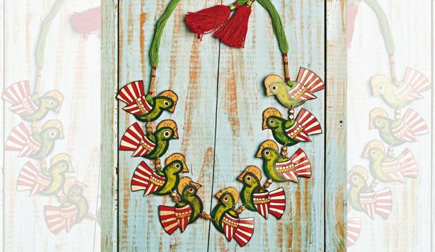 Hand-painted leather puppetry bird necklace from Andhra Pradesh