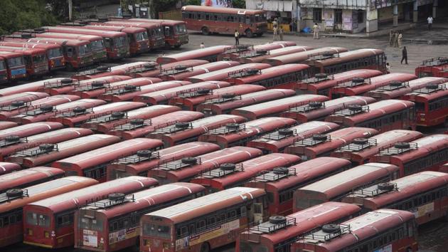 Around 52 private buses and 12 trucks were penalised late on Wednesday night for not using the depots and instead parking on the road.(Satish Bate/HT Photo)