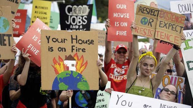 People took to the streets to demand that leaders tackle climate change in the run-up to a U.N. summit. (AP Photo) People took to the streets to demand that leaders tackle climate change in the run-up to a U.N. summit. (AP Photo)