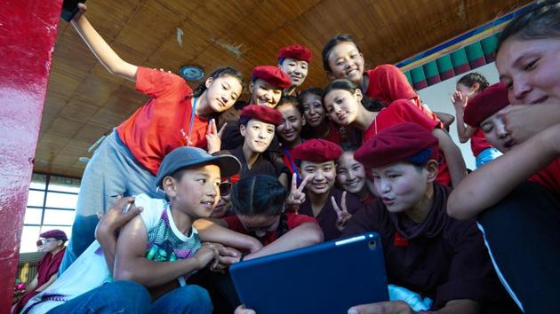 The girls at this year’s Kung Fu bootcamp click a selfie with the nuns on the last day the of workshop before they leave for their respective homes. While a week isn’t much, it’s certainly enough for budding friendships. (Hemanshi Kamani / HT Photo) 
