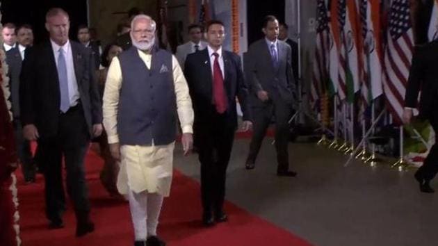 Prime Minister Narendra Modi arrived at the packed NRG stadium in Houston in a dark checked jacket waving to the 50,000 strong crowd.(TEXAS INDIA FORUM.)