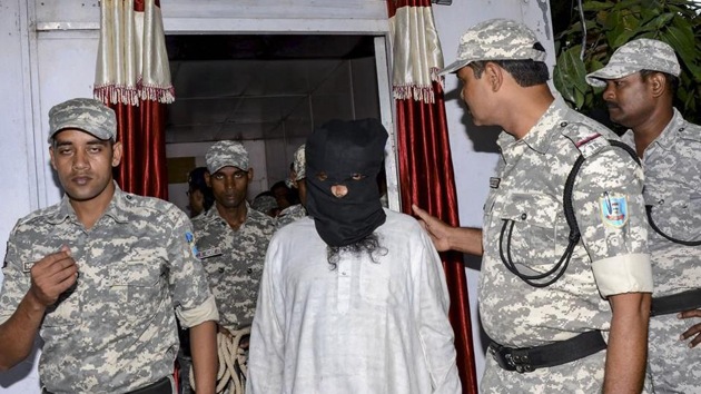 Al-Qaeda terrorist Mohammad Kalimuddin Mujahiri, arrested by Anti Terrorist Squad (ATS) from Azad Nagar in Jamshedpur (PTI Photo) Al-Qaeda terrorist Mohammad Kalimuddin Mujahiri, arrested by Anti Terrorist Squad (ATS) from Azad Nagar in Jamshedpur (PTI Photo)