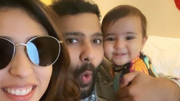Rohit Sharma (middle) poses along with his family.(Instagram)