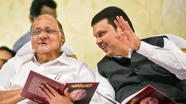 President of NCP Mr. Sharad Pawar and Maharashtra Chief Minister Devendra Fadnavis during 61st Birthday celebration of Mr.Dilip Walse Patil and Gauravgranth Prakashan at Ravindranatya Mandir, Prabhadevi in Mumbai. (Photo by Pratik Chorge/Hindustan Times) President of NCP Mr. Sharad Pawar and Maharashtra Chief Minister Devendra Fadnavis during 61st Birthday celebration of Mr.Dilip Walse Patil and Gauravgranth Prakashan at Ravindranatya Mandir, Prabhadevi in Mumbai. (Photo by Pratik Chorge/Hindustan Times)