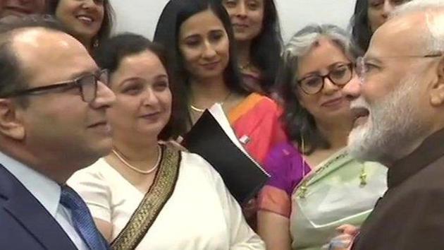 PM Modi meets Kashmiri Pundits in Houston. (ANI/Twitter) PM Modi meets Kashmiri Pundits in Houston. (ANI/Twitter)