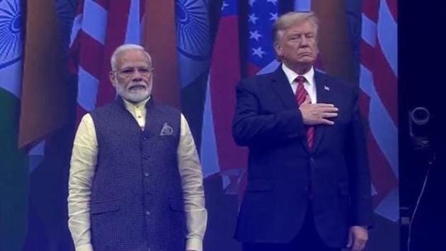 Prime Minister Narendra Modi and US President Donald Trump at Houston’s packed NRG stadium on Sunday.(TEXAS INDIA FORUM) Prime Minister Narendra Modi and US President Donald Trump at Houston’s packed NRG stadium on Sunday.(TEXAS INDIA FORUM)
