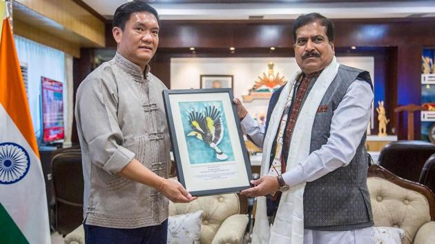 Arunachal Pradesh Chief Minister Pema Khandu with Union MoS of Railways Suresh Channabasappa Angadi during a meeting, in Itanagar. (PTI) Arunachal Pradesh Chief Minister Pema Khandu with Union MoS of Railways Suresh Channabasappa Angadi during a meeting, in Itanagar. (PTI)