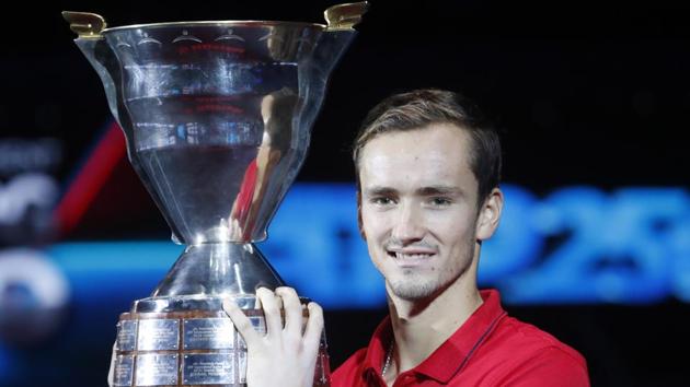 Daniil Medvedev holds the trophy after winning the St. Petersburg Open ATP tennis tournament.(AP)