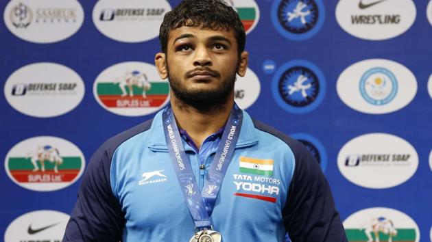 Deepak Punia poses with his medal.(AP) Deepak Punia poses with his medal.(AP)