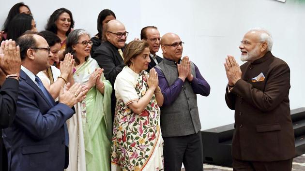 Prime Minister Narendra Modi exchanges greetings with a delegation of Kashmiri Pandits during an interaction with the Indian community in Houston, Texas, USA. (PTI) Prime Minister Narendra Modi exchanges greetings with a delegation of Kashmiri Pandits during an interaction with the Indian community in Houston, Texas, USA. (PTI)