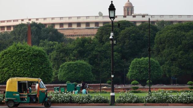 An auto-rickshaw sits parked next to a closed-circuit television (CCTV) security camera on a lamp post in front of Parliament House in New Delhi. Many Indian companies won’t be able to bid on the facial-recognition system because the current tender requires them to meet standards established by the US National Institute of Science and Technology, according to Rai. (Anindito Mukherjee / Bloomberg) An auto-rickshaw sits parked next to a closed-circuit television (CCTV) security camera on a lamp post in front of Parliament House in New Delhi. Many Indian companies won’t be able to bid on the facial-recognition system because the current tender requires them to meet standards established by the US National Institute of Science and Technology, according to Rai. (Anindito Mukherjee / Bloomberg)