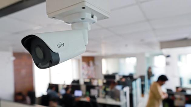 A surveillance camera with facial recognition technology operates at the headquarters of security system developer Staqu Technologies Pvt. in Gurugram, Haryana. The Modi government is planning to set up one of the world’s largest facial recognition systems, potentially a lucrative opportunity for surveillance companies and a nightmare for privacy advocates who fear it will lead to a Chinese-style Orwellian state. (Anindito Mukherjee / Bloomberg) A surveillance camera with facial recognition technology operates at the headquarters of security system developer Staqu Technologies Pvt. in Gurugram, Haryana. The Modi government is planning to set up one of the world’s largest facial recognition systems, potentially a lucrative opportunity for surveillance companies and a nightmare for privacy advocates who fear it will lead to a Chinese-style Orwellian state. (Anindito Mukherjee / Bloomberg)