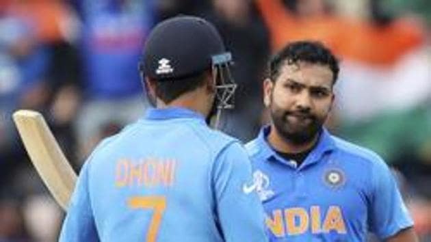 File photo of Rohit Sharma and MS Dhoni. (AP) File photo of Rohit Sharma and MS Dhoni. (AP)