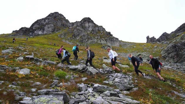 People climb to take part in a mourning ceremony as awareness to climate change, for the disappearing Pizol glacier, in Mels, Switzerland. (REUTERS) People climb to take part in a mourning ceremony as awareness to climate change, for the disappearing Pizol glacier, in Mels, Switzerland. (REUTERS)